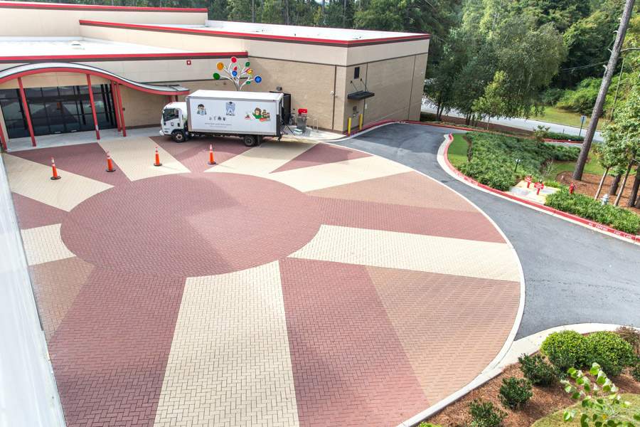 Commercial hardscape design with patterned pavers by A Abby Group in Metro Atlanta.